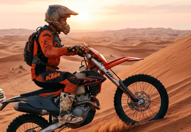 KTM 450 dirt bike on the red sand at Al Lahbab near Dubai